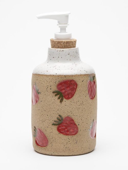 Handmade by Osso Ceramics in Philadelphia, this strawberry-stamped stoneware soap dispenser adds playful charm and handcrafted style to any kitchen or bath.