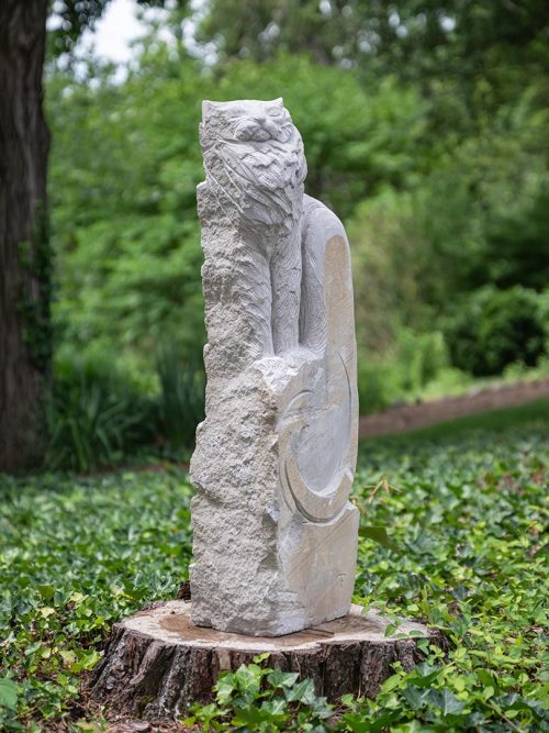 Limestones sculpture by artist Todd Frahm titled Repose.